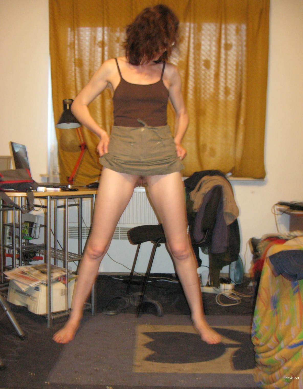 Woman Explicitly Shows What's Under Her Skirt in Amateur Photo