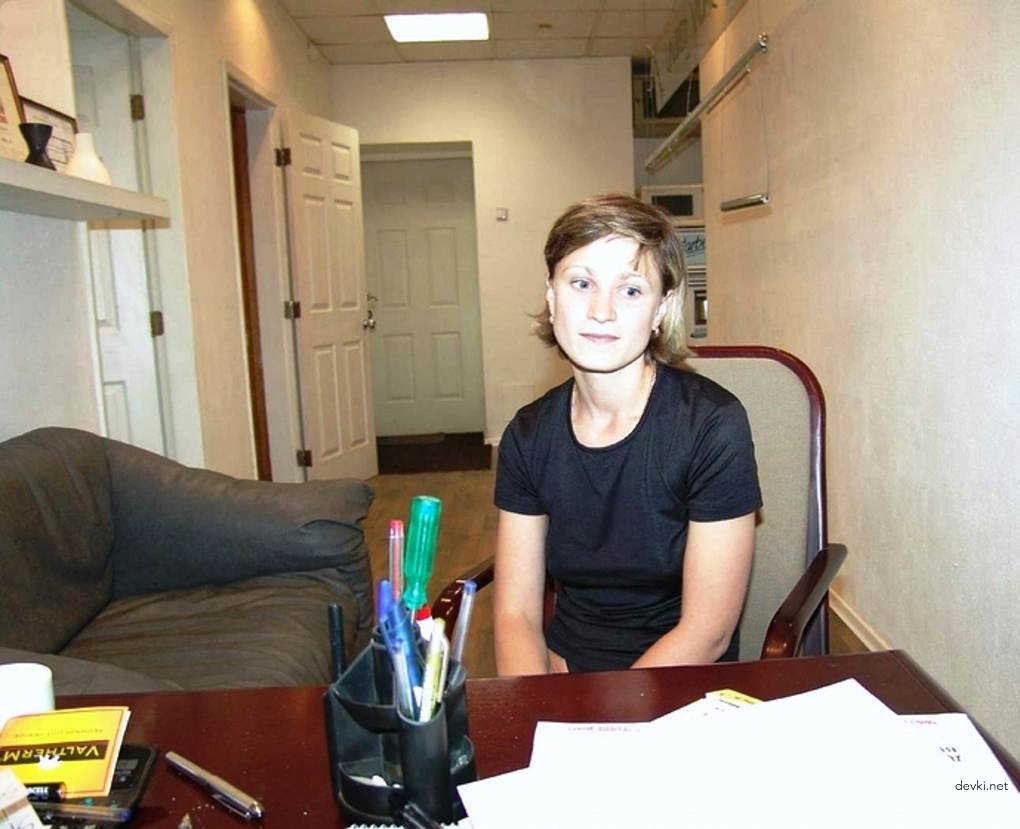 Amateur Secretary Poses Nude: Explicit Office Photoshoot