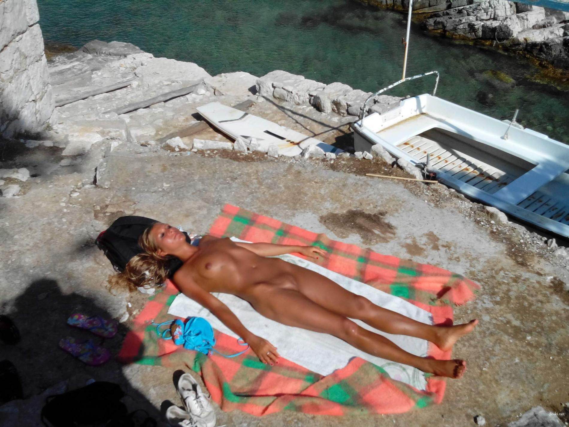 Sizzling Blonde Babe Sunbathing Topless - Amateur Beach Photo