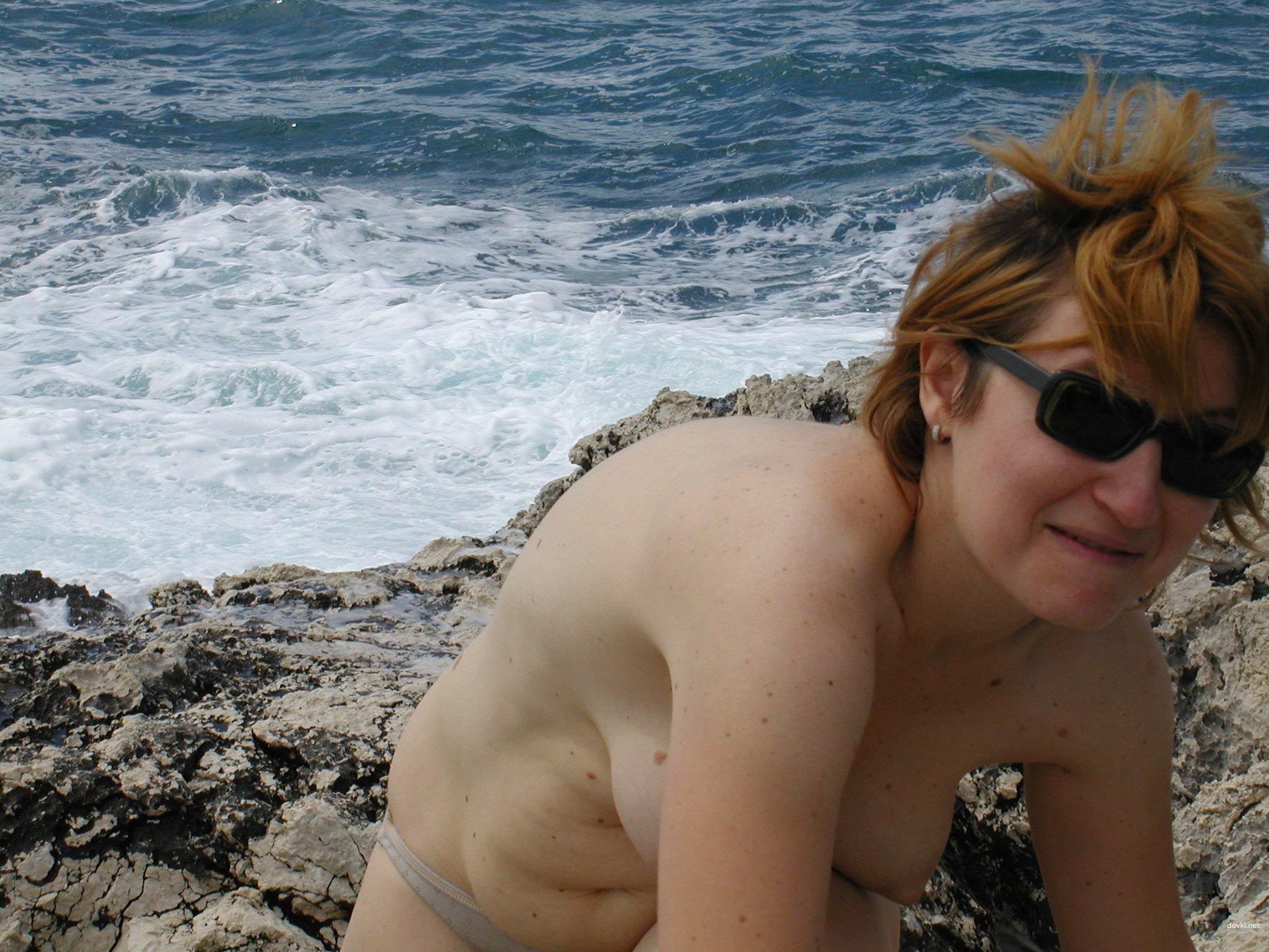 Mature Lady Gives Blowjob on Vacation: Explicit Oral Sex Scene