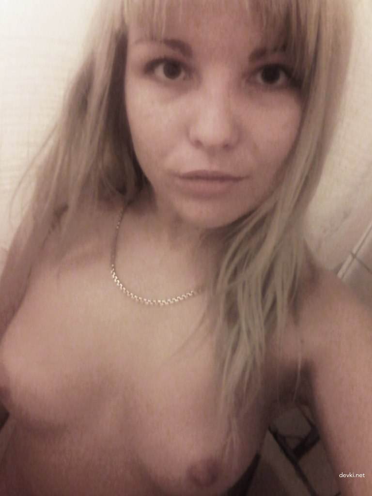 Amateur Hotel Room Photo Shoot with Explicit Russian Girl - Sensual and Provocative Content