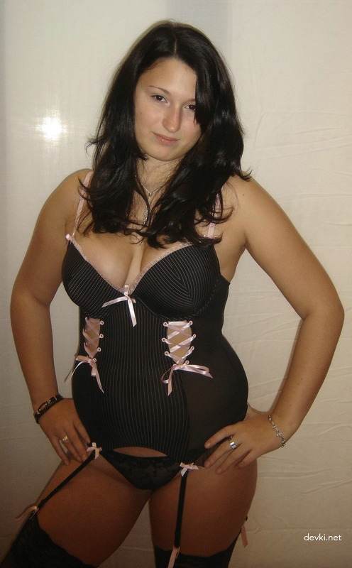 Voluptuous Brunette Poses in Erotic Lingerie: Amateur Explicit Photo