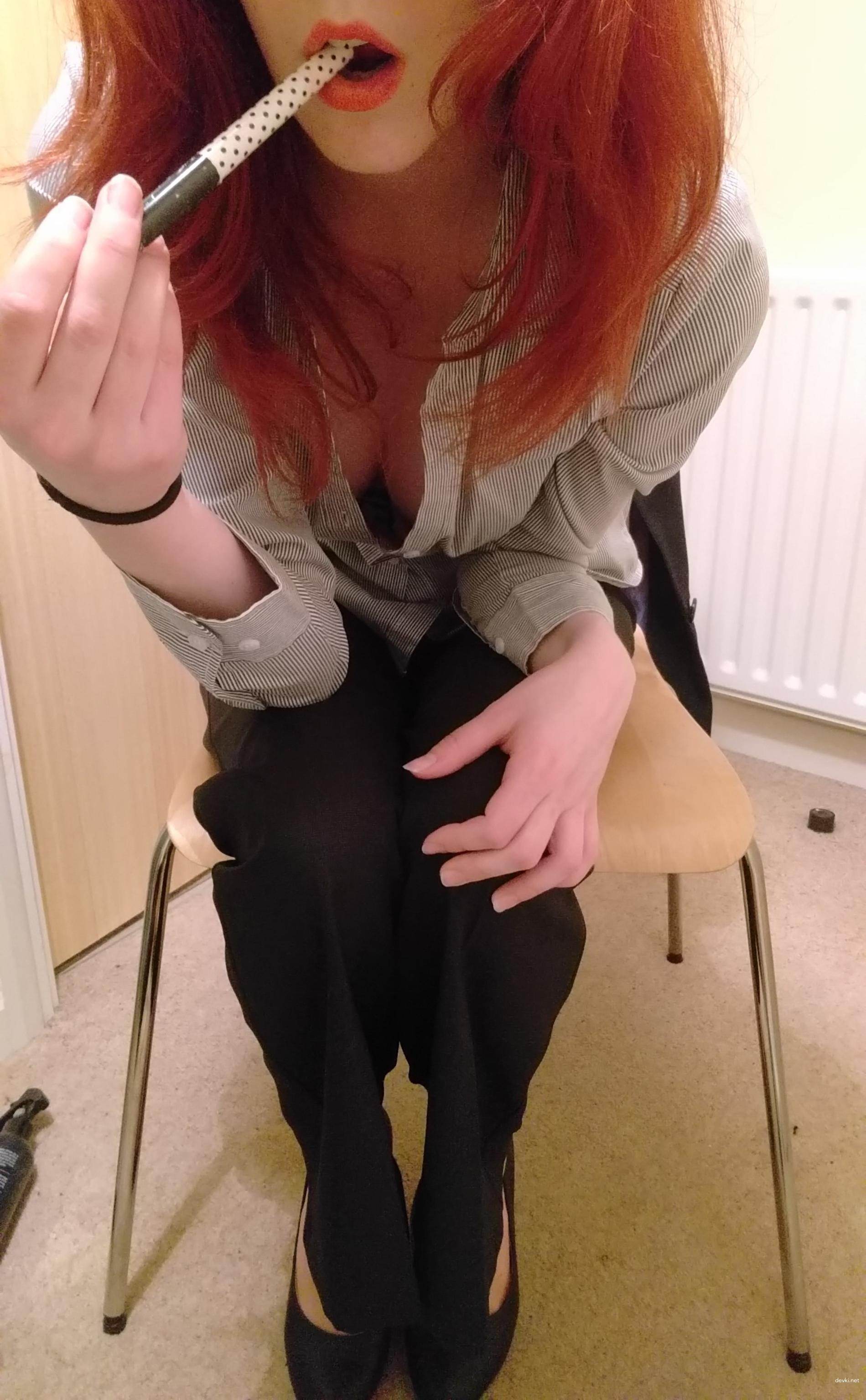 Redhead Strips in Office: Amateur Explicit Photo