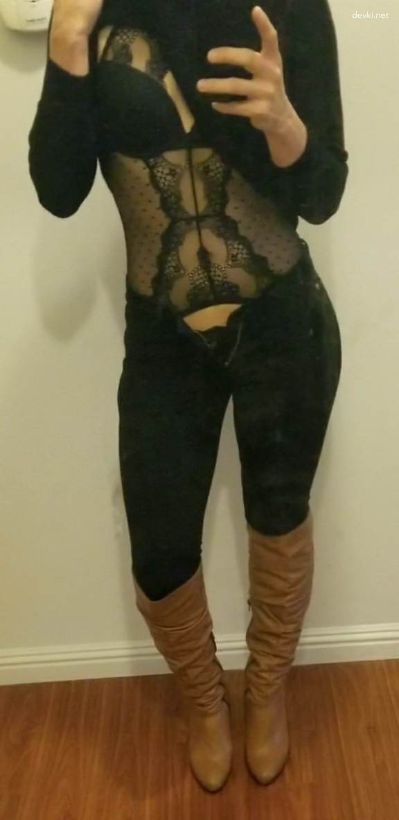 Brunette in stockings impaled on dildo