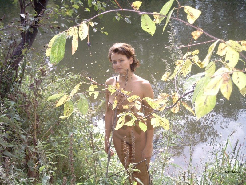 Seductive MILF in the Forest: Amateur Photo with Explicit Content