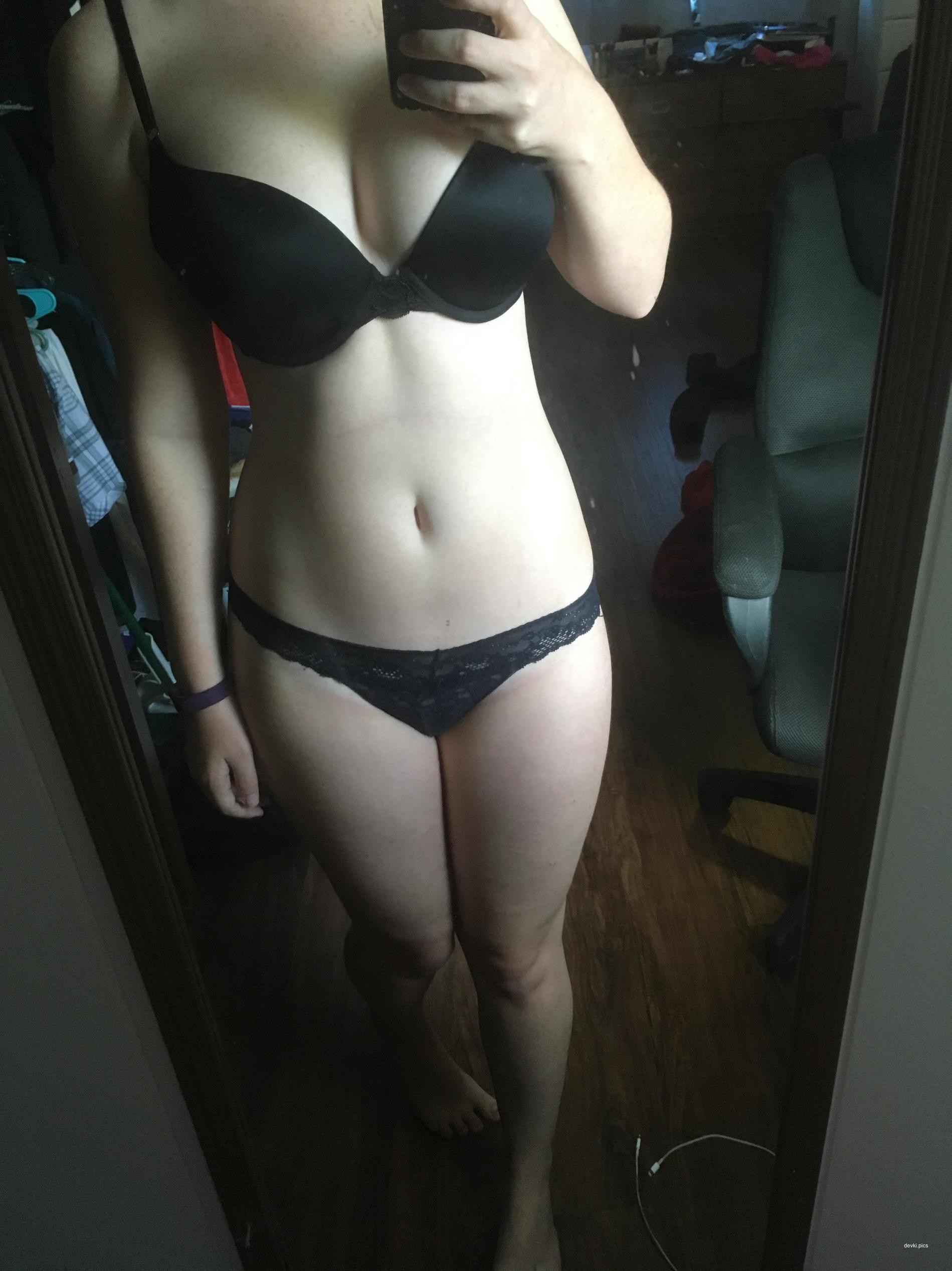 Naked Cutie with Phone in Front of Mirror: Explicit Amateur Photo