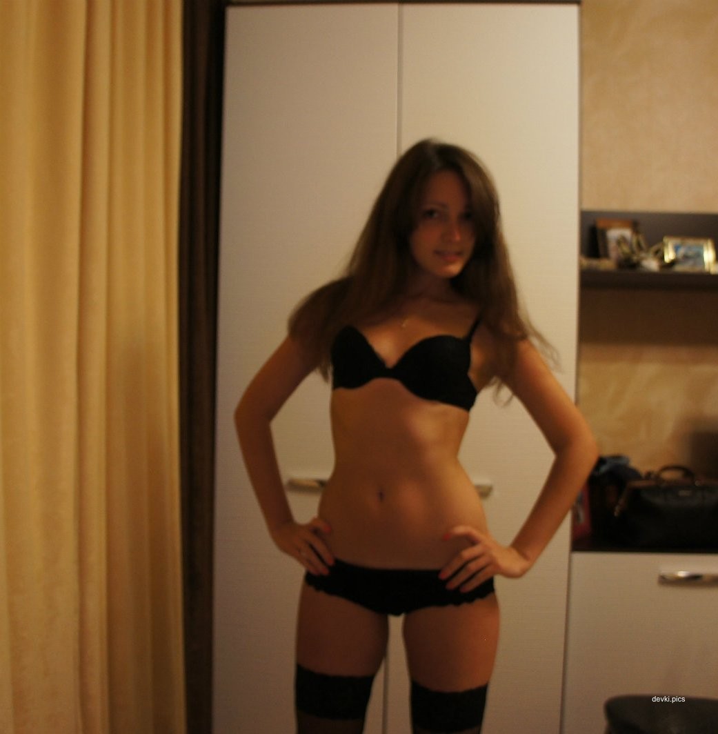 Russian beauty strips off panties in amateur photo shoot