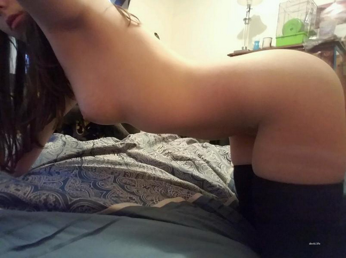 Seductive amateur girl in warm stockings flaunting explicit charm