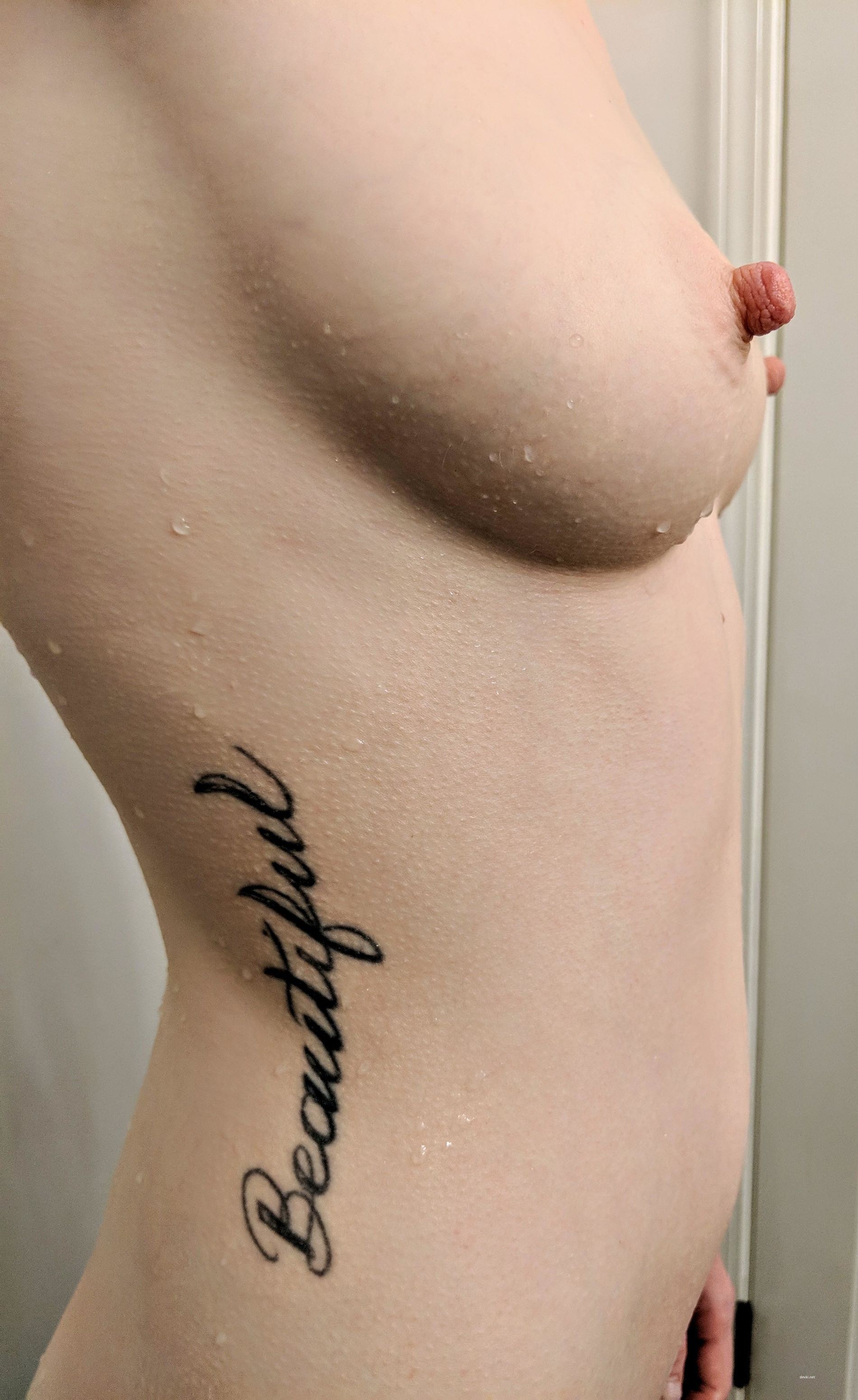 Exposed Nipples of Naked Girl: Amateur Photo with Provocative Keywords