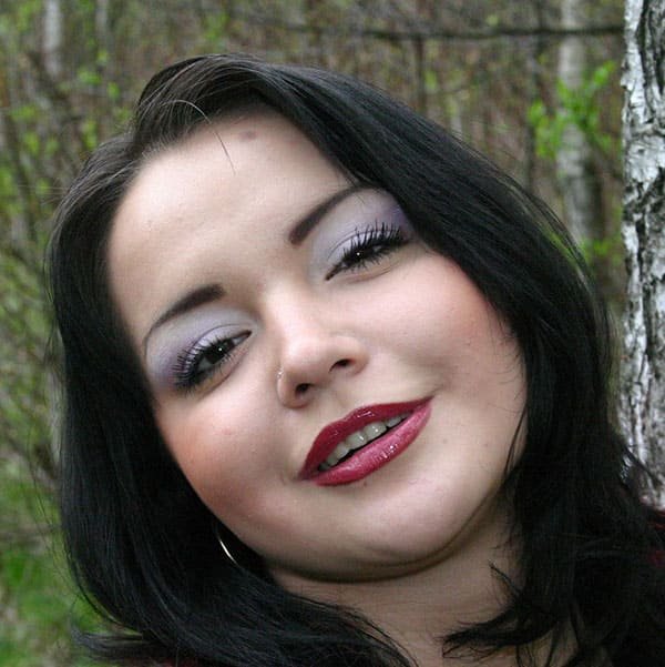 Explicit Amateur Photo: Revealing Her Assets in the Woods