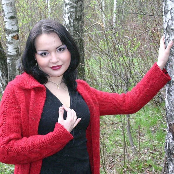 Explicit Amateur Photo: Revealing Her Assets in the Woods