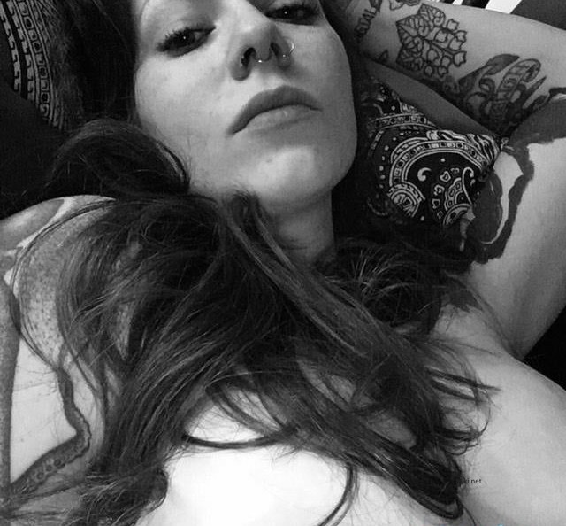 Busty Babe with Tattoo: Amateur Explicit Photo of a Voluptuous Beauty