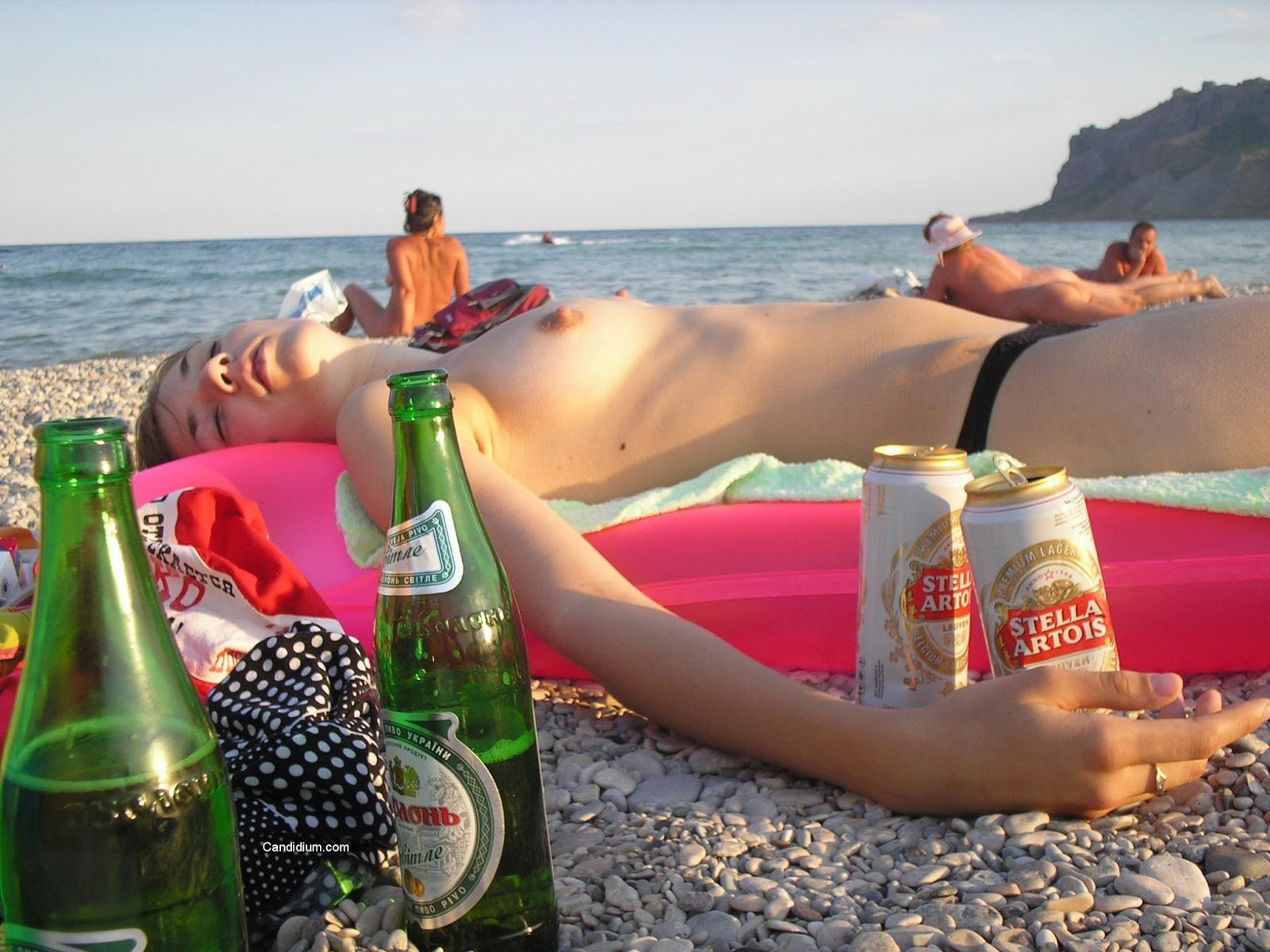 Beach Flashing: Explicit Amateur Photos of Nudity on the Beach