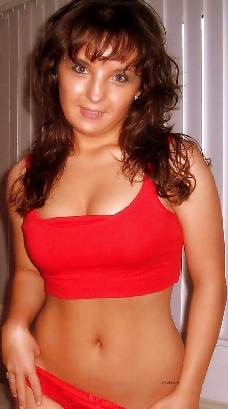 Redhead Cutie's Erotic Amateur Photos: Explicit and Sensual Content