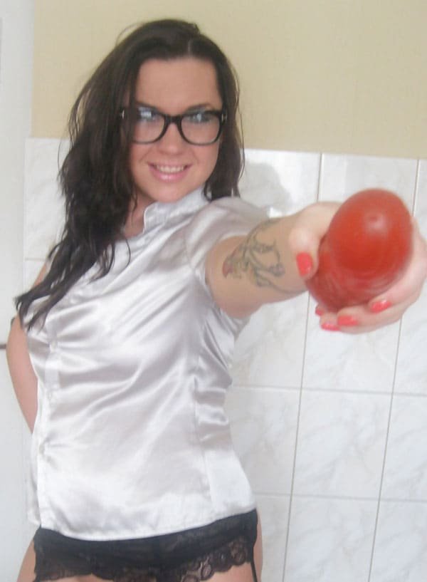 Hot babe masturbates pussy in kitchen