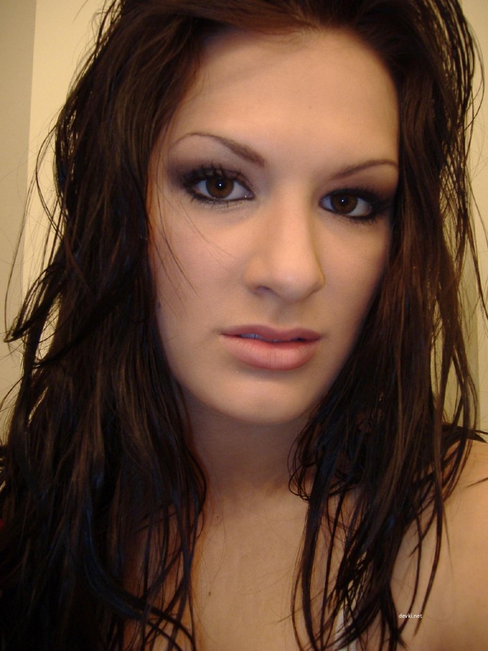 Naughty Brunette Amateur Exposes All in Explicit Photo Shoot