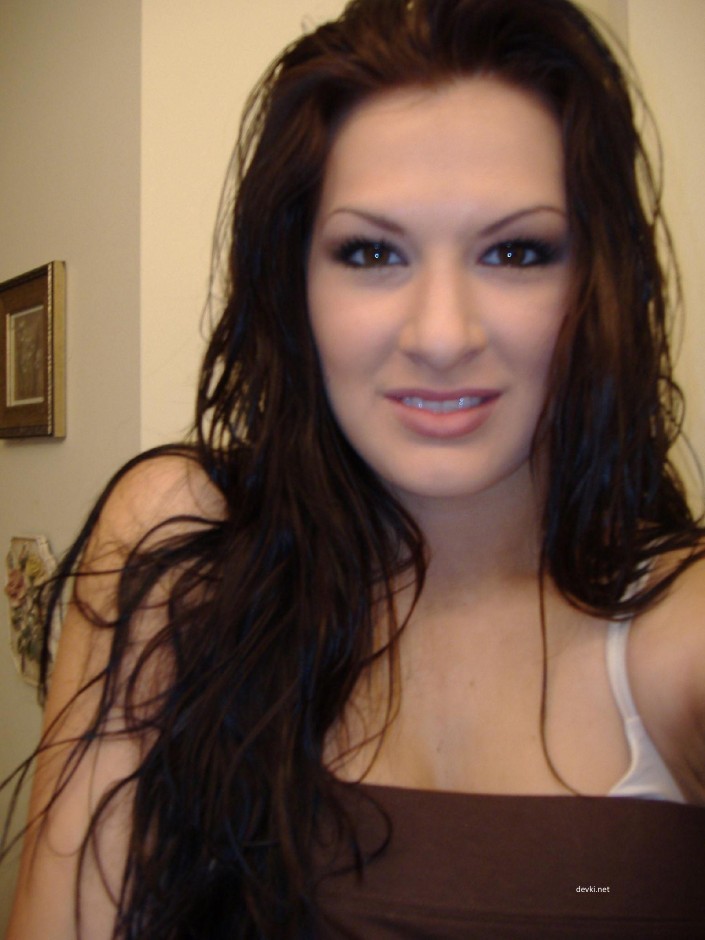 Naughty Brunette Amateur Exposes All in Explicit Photo Shoot