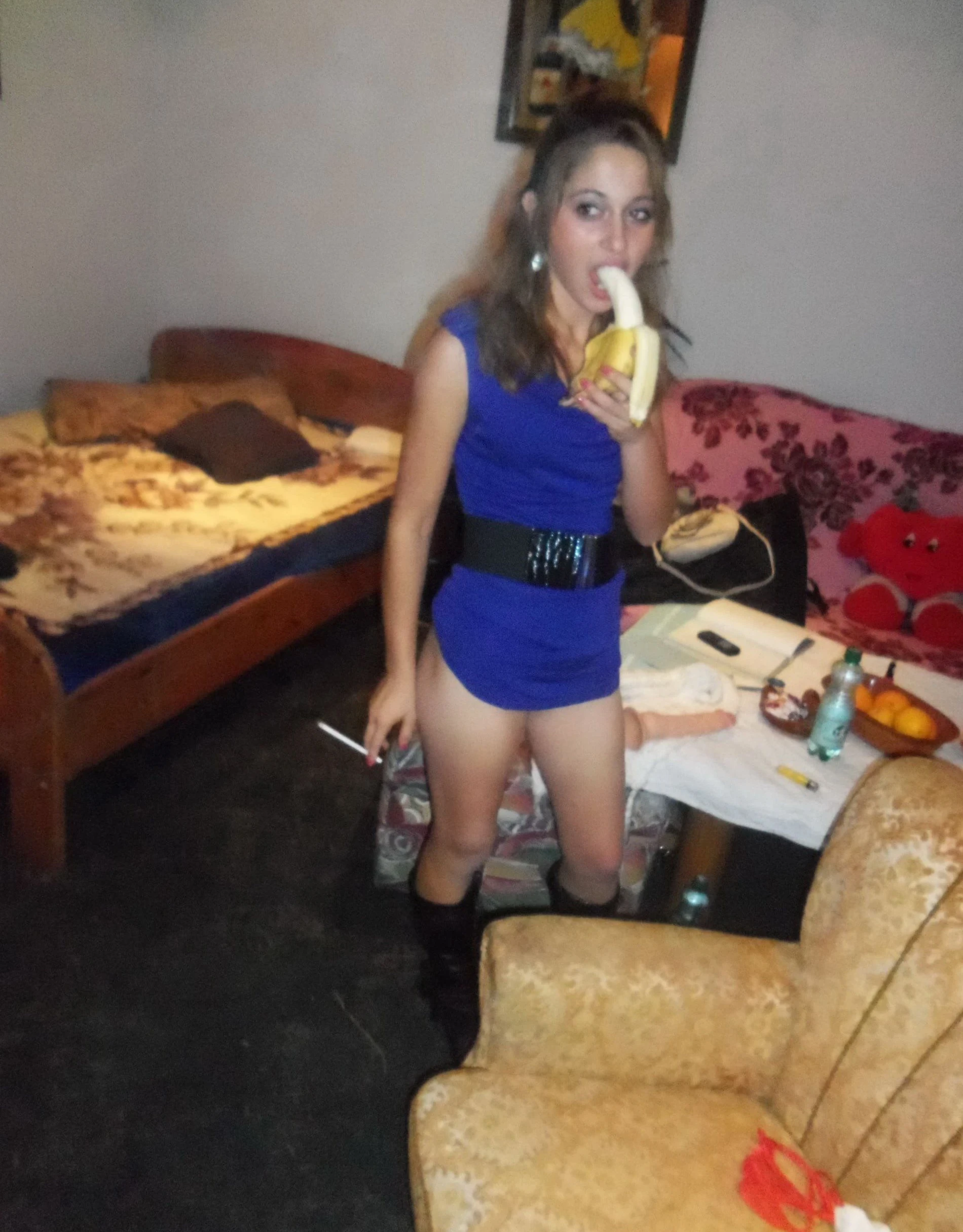 Girl strips off pantyhose and panties in front of guy - Explicit amateur porn photo.