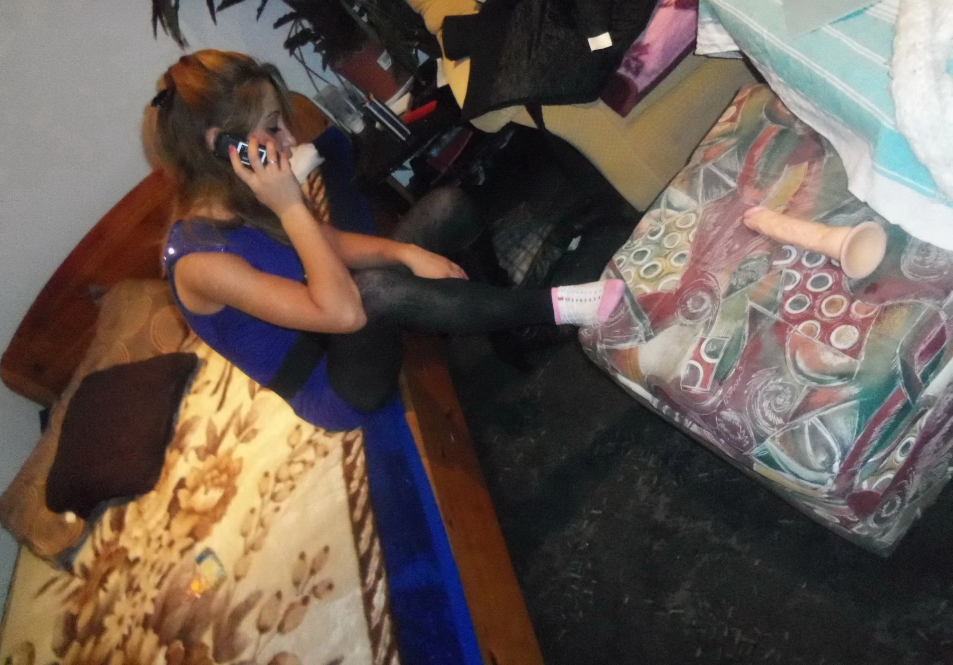 Girl strips off pantyhose and panties in front of guy - Explicit amateur porn photo.