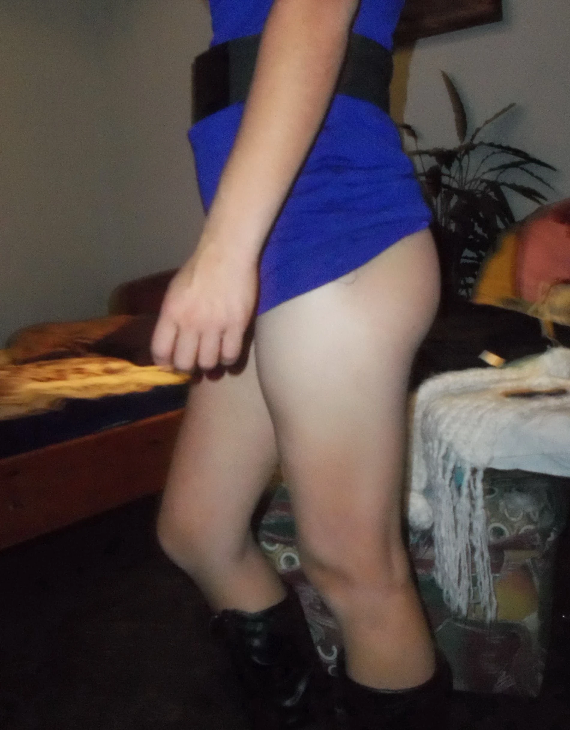 Girl strips off pantyhose and panties in front of guy - Explicit amateur porn photo.