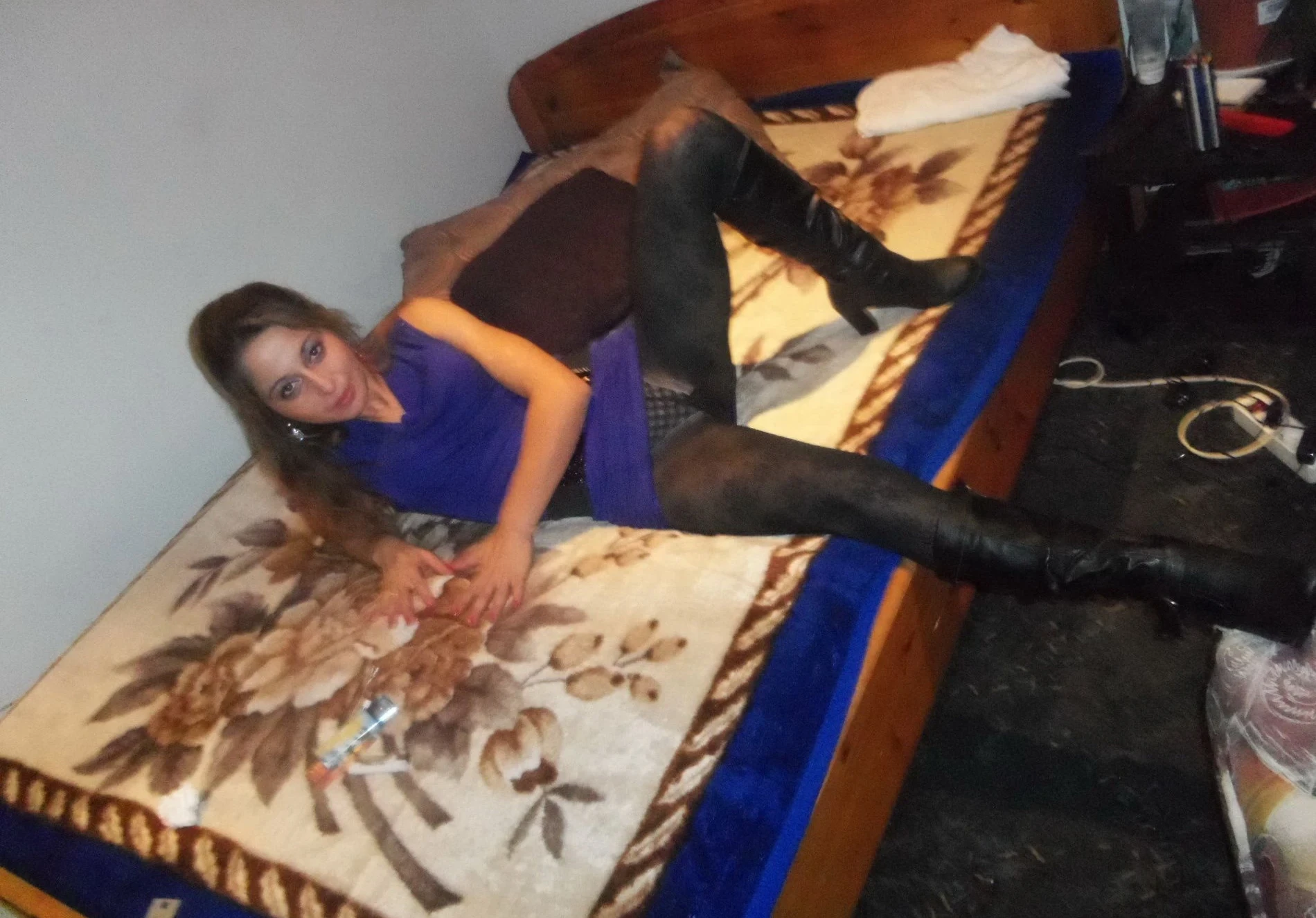 Girl strips off pantyhose and panties in front of guy - Explicit amateur porn photo.