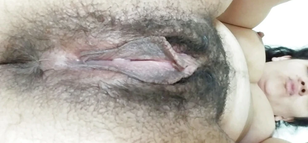 Dark-Skinned Beauty with Hairy Pussy (Part 2): Explicit Amateur Photos