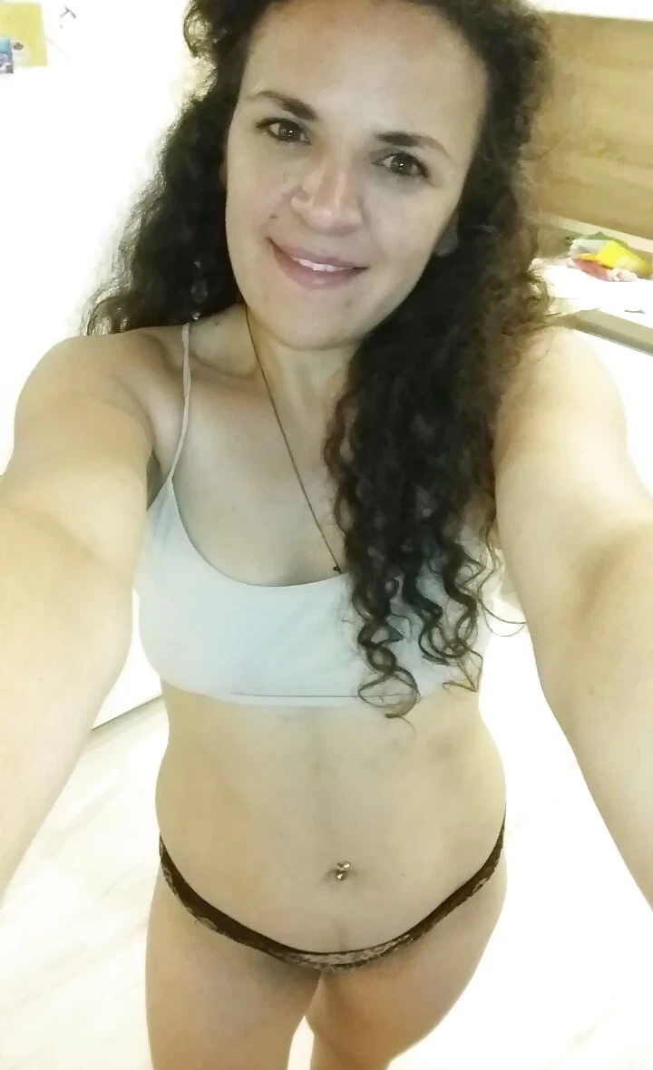 Dark-Skinned Beauty with Hairy Pussy (Part 2): Explicit Amateur Photos