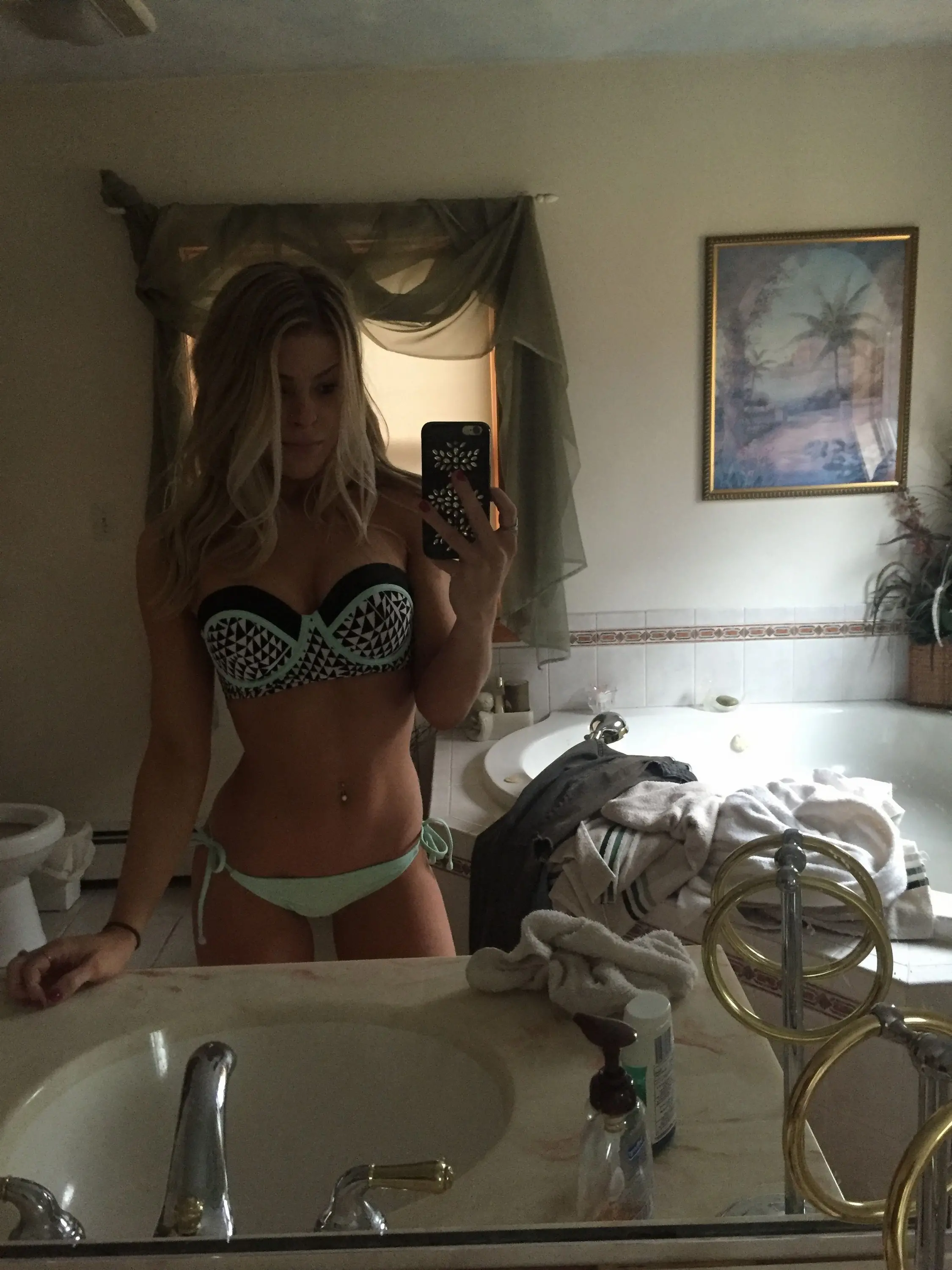 Seductive Blonde flaunts Nude Breasts in Perfect Shape