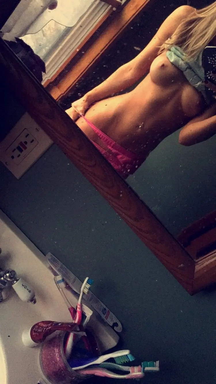 Seductive Blonde flaunts Nude Breasts in Perfect Shape