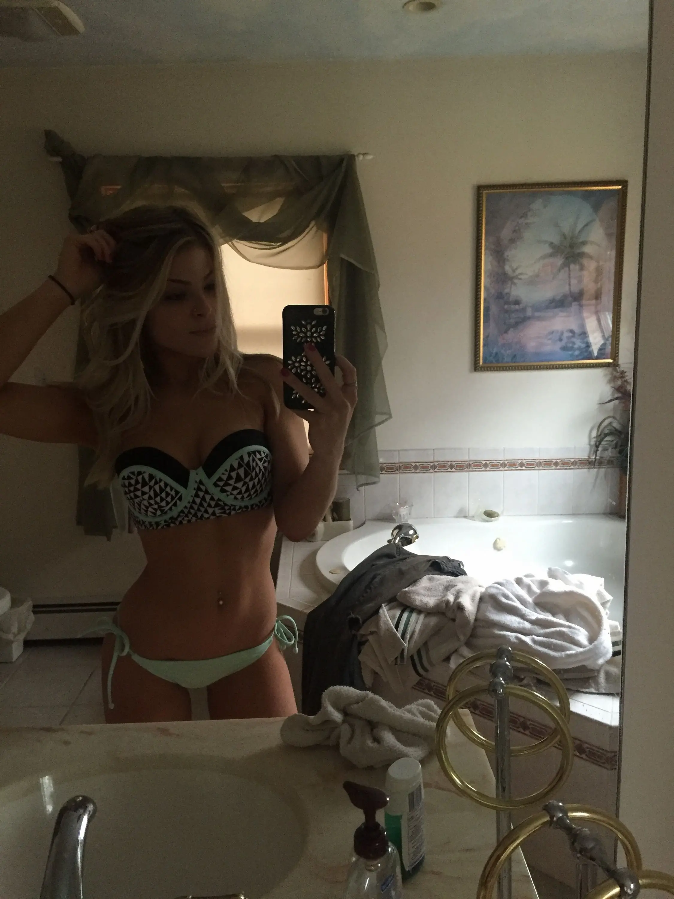 Seductive Blonde flaunts Nude Breasts in Perfect Shape