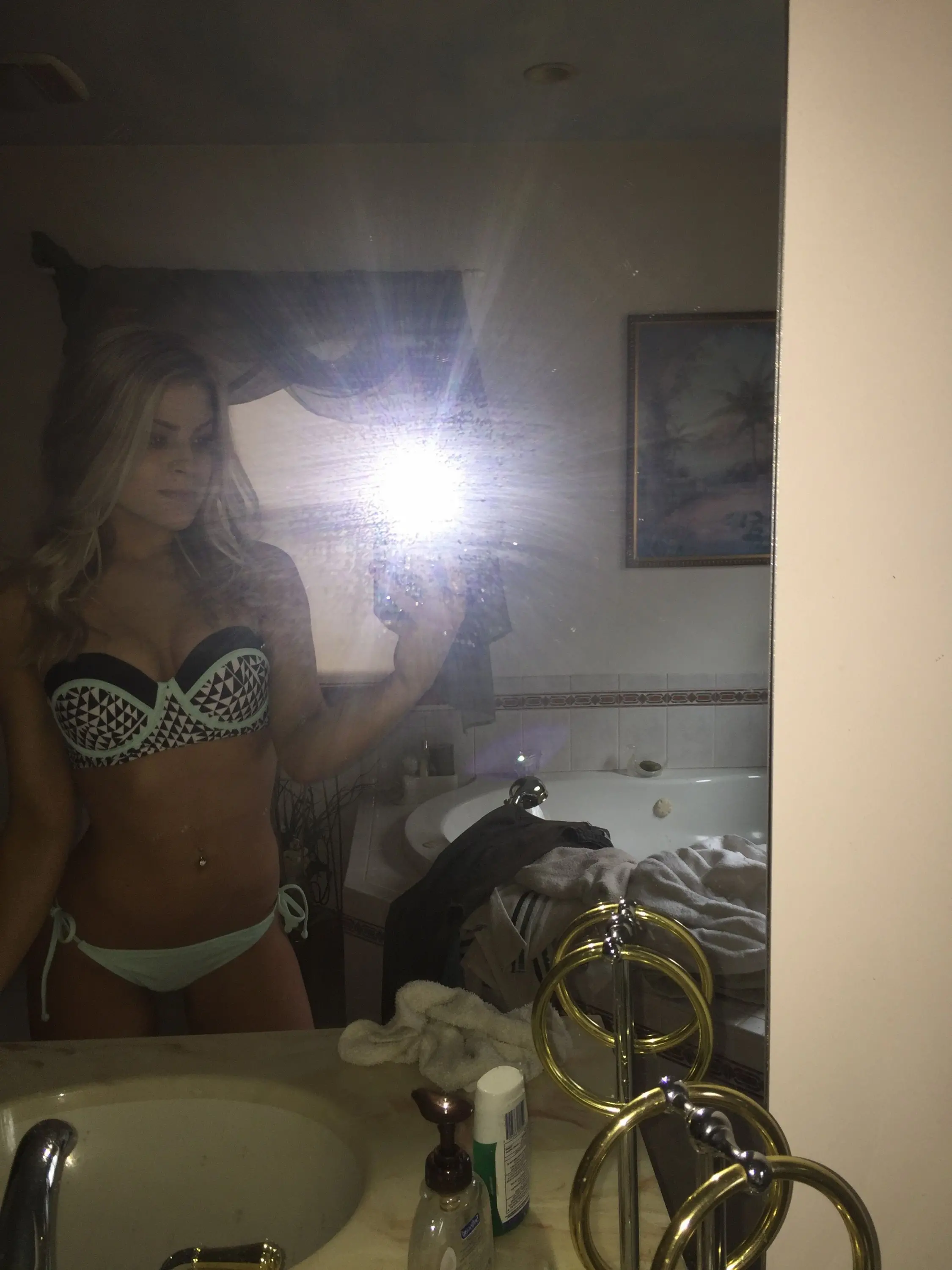 Seductive Blonde flaunts Nude Breasts in Perfect Shape