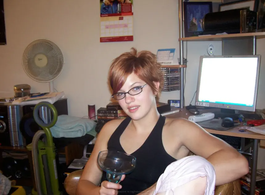 Amateur Redhead with Long Legs Poses Naked, Revealing Wet Pussy