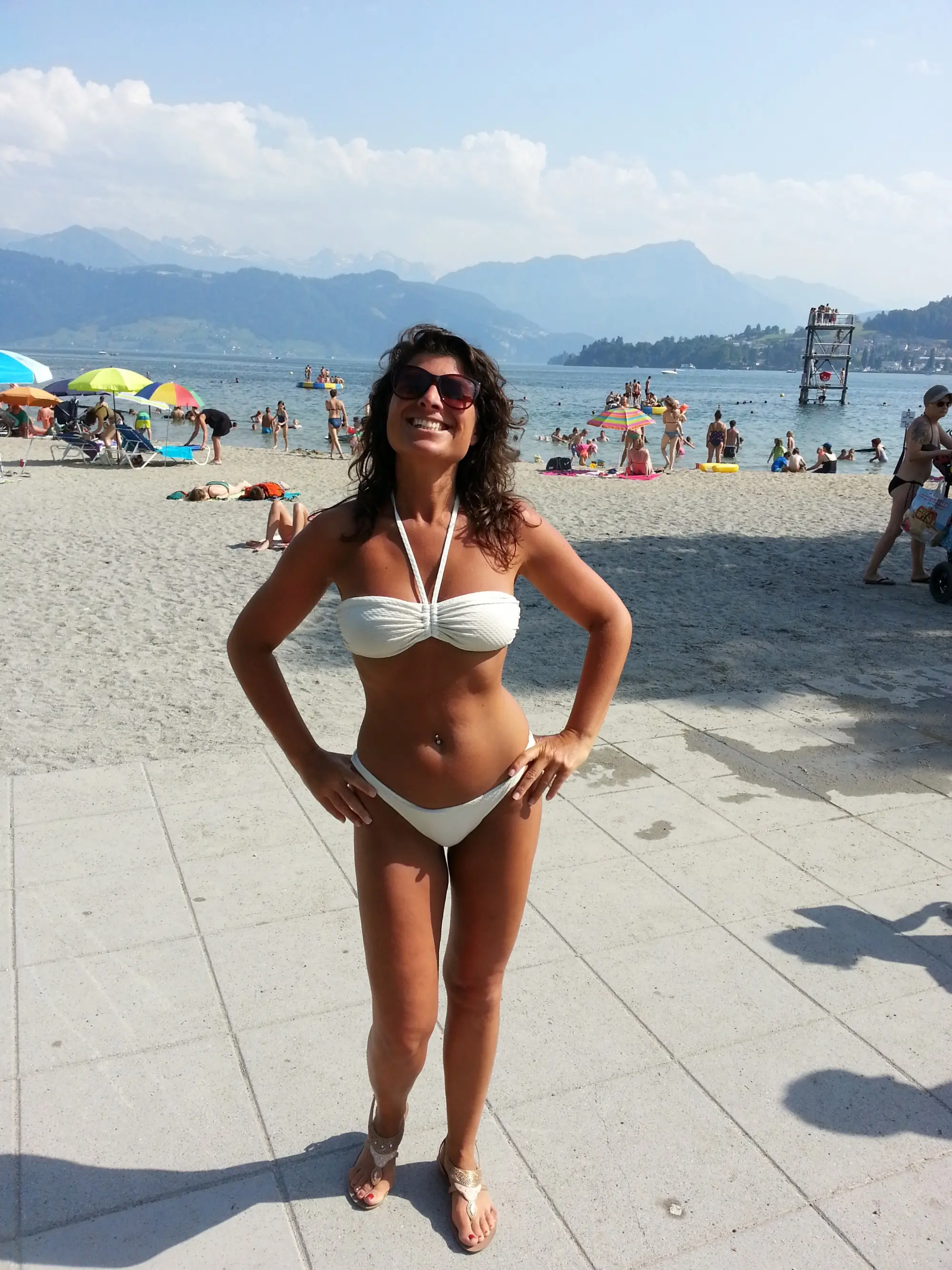 Mature Woman Shows Off Sexy Tan on Nude Body: Amateur Explicit Photo