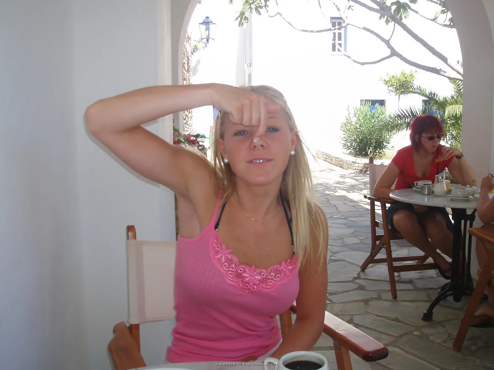 Blonde Exposes Tanned Boobs: Amateur Topless Photo Shoot