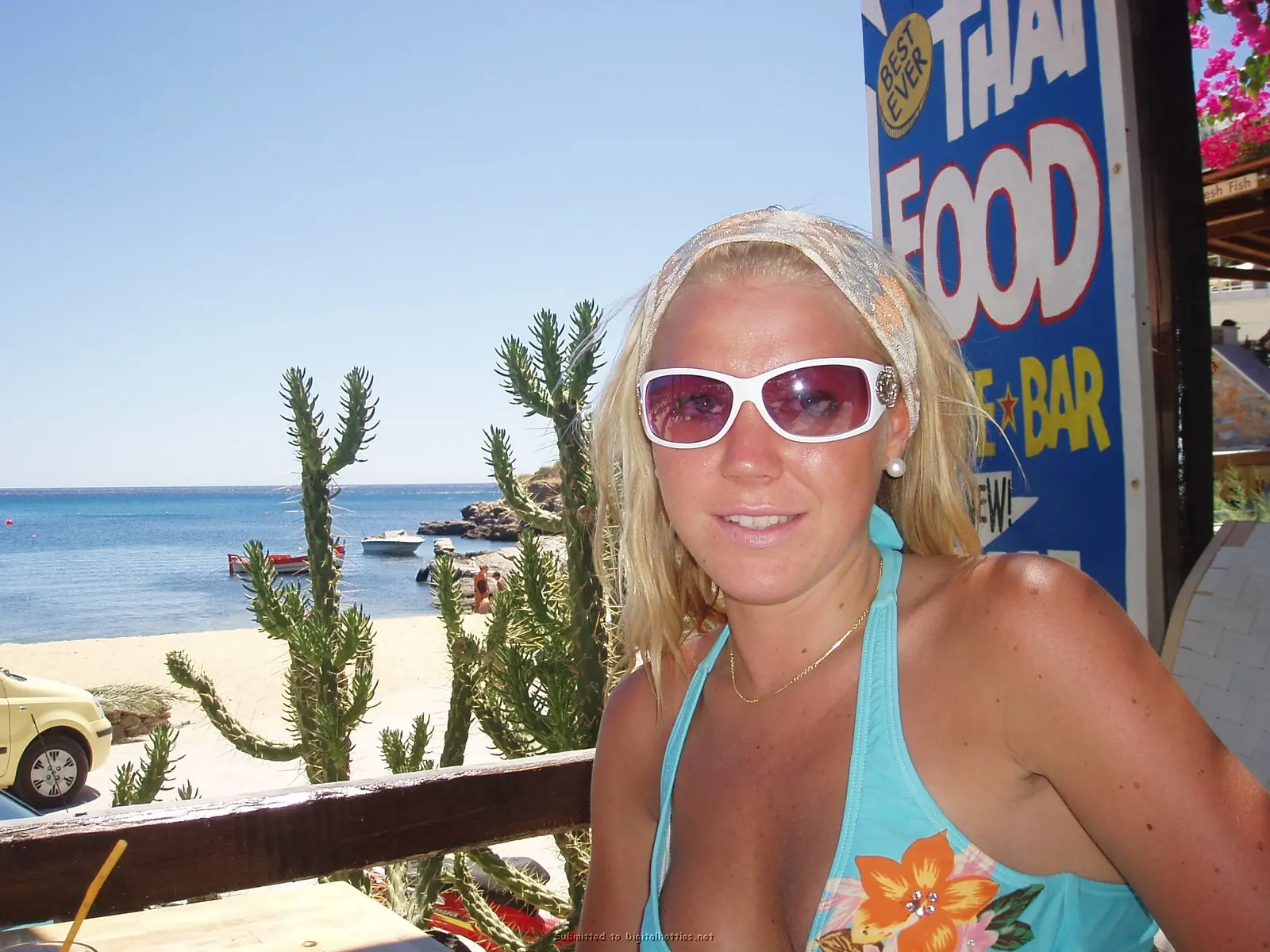 Blonde Exposes Tanned Boobs: Amateur Topless Photo Shoot