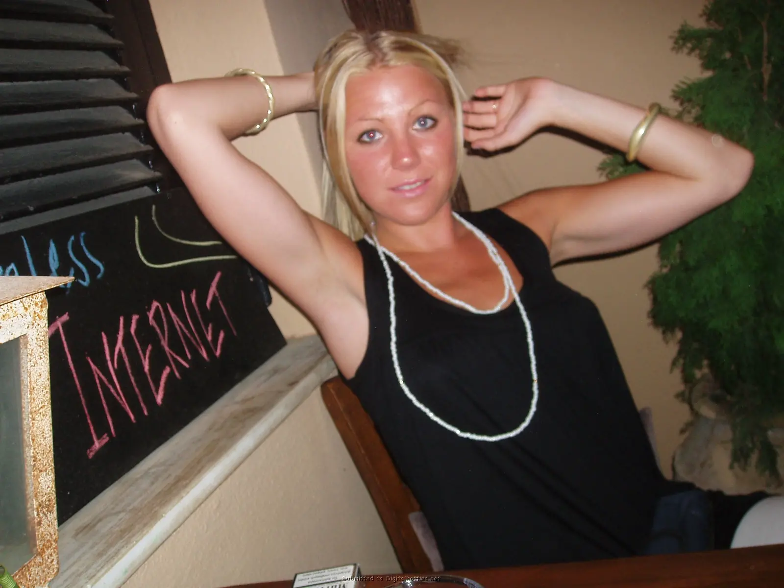 Blonde Exposes Tanned Boobs: Amateur Topless Photo Shoot