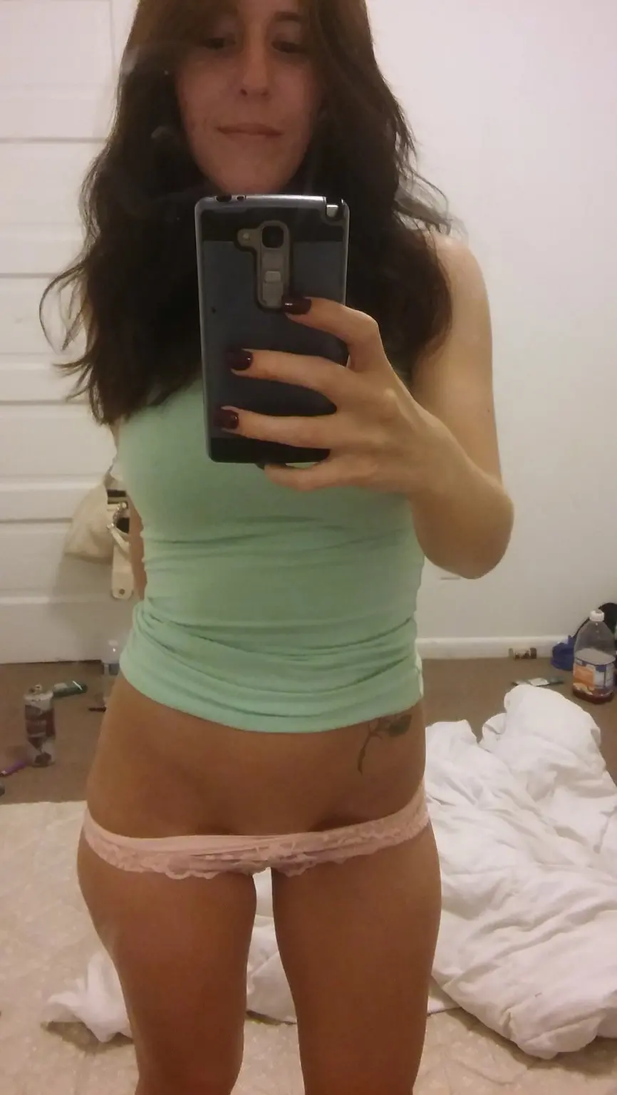 Naked Busty Woman Poses in Explicit Selfie Photo
