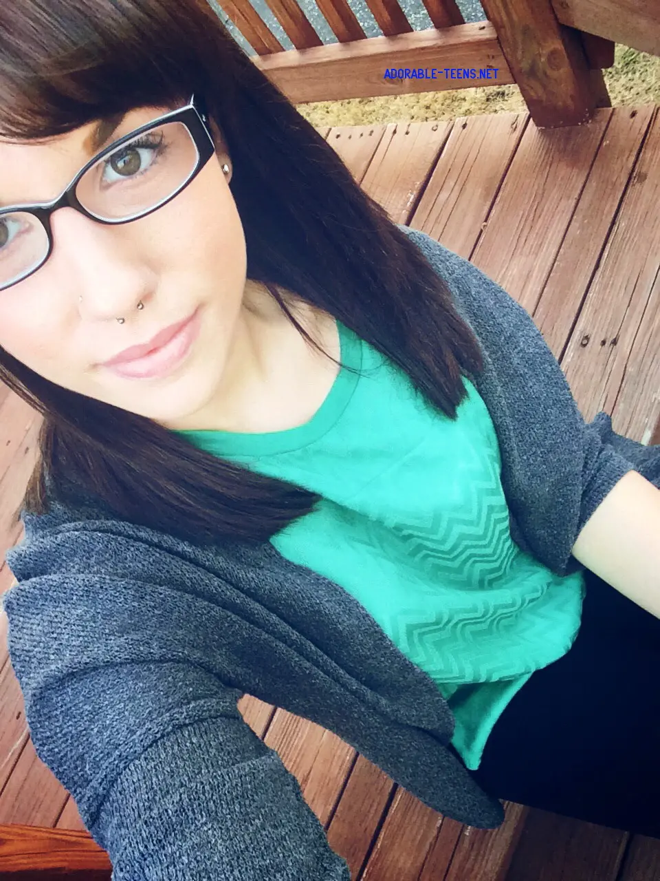 Seductive Girl in Glasses Tempts with Smile - Amateur Explicit Photo