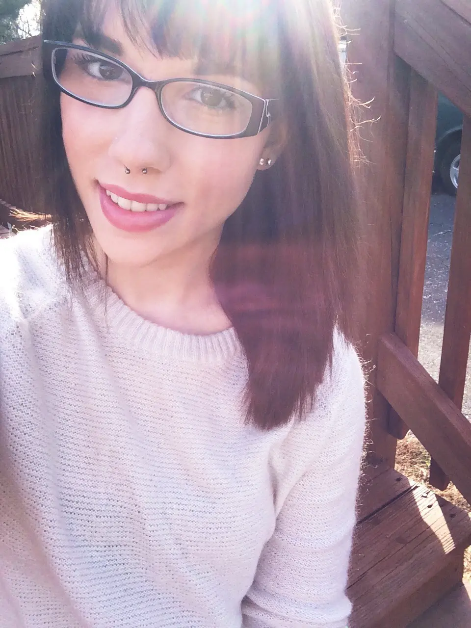 Seductive Girl in Glasses Tempts with Smile - Amateur Explicit Photo