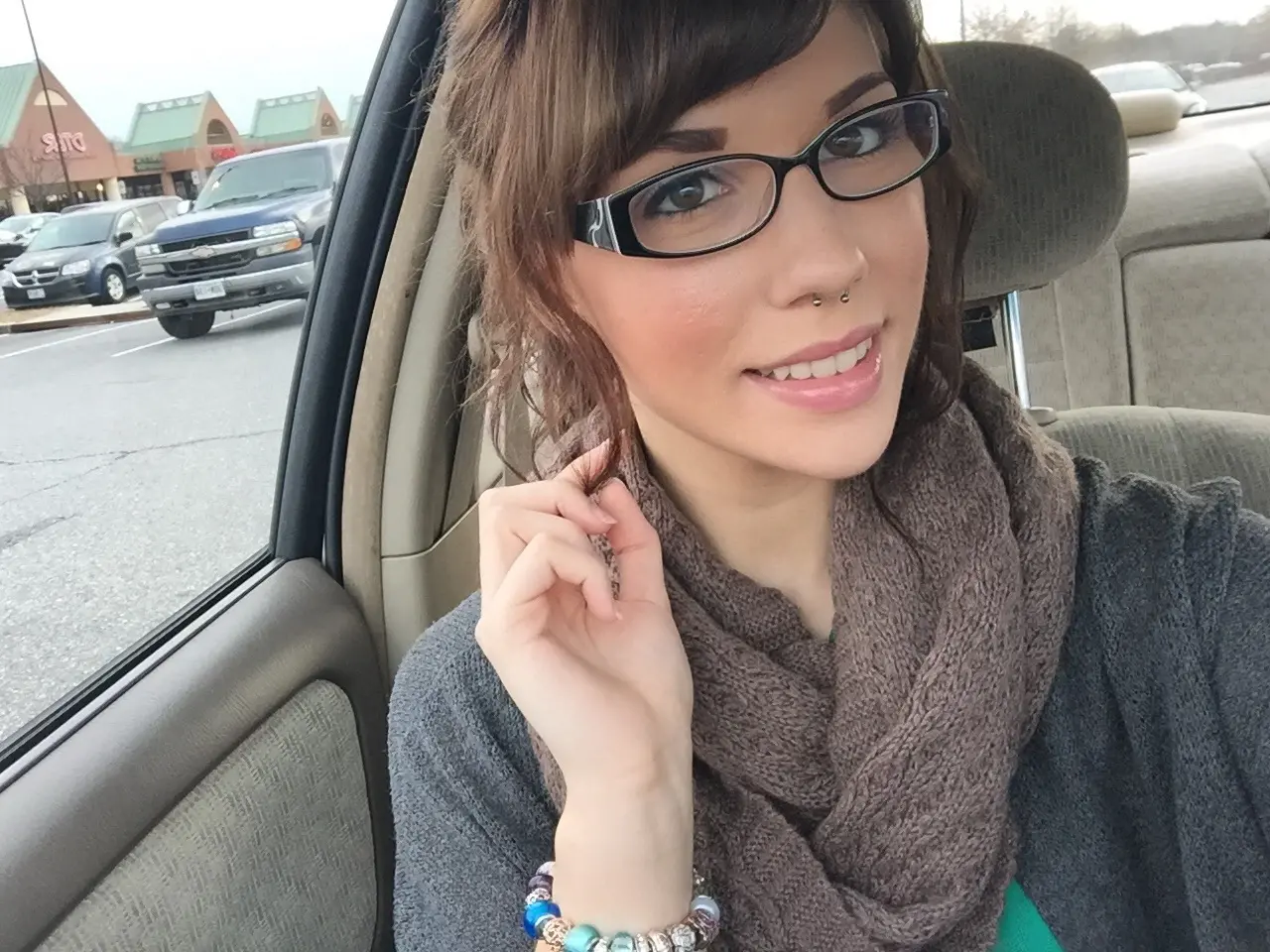 Seductive Girl in Glasses Tempts with Smile - Amateur Explicit Photo