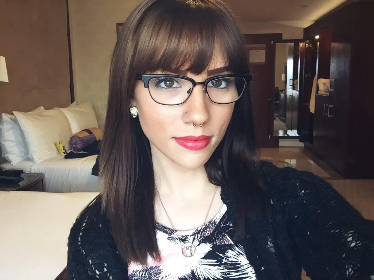 Seductive Girl in Glasses Tempts with Smile - Amateur Explicit Photo