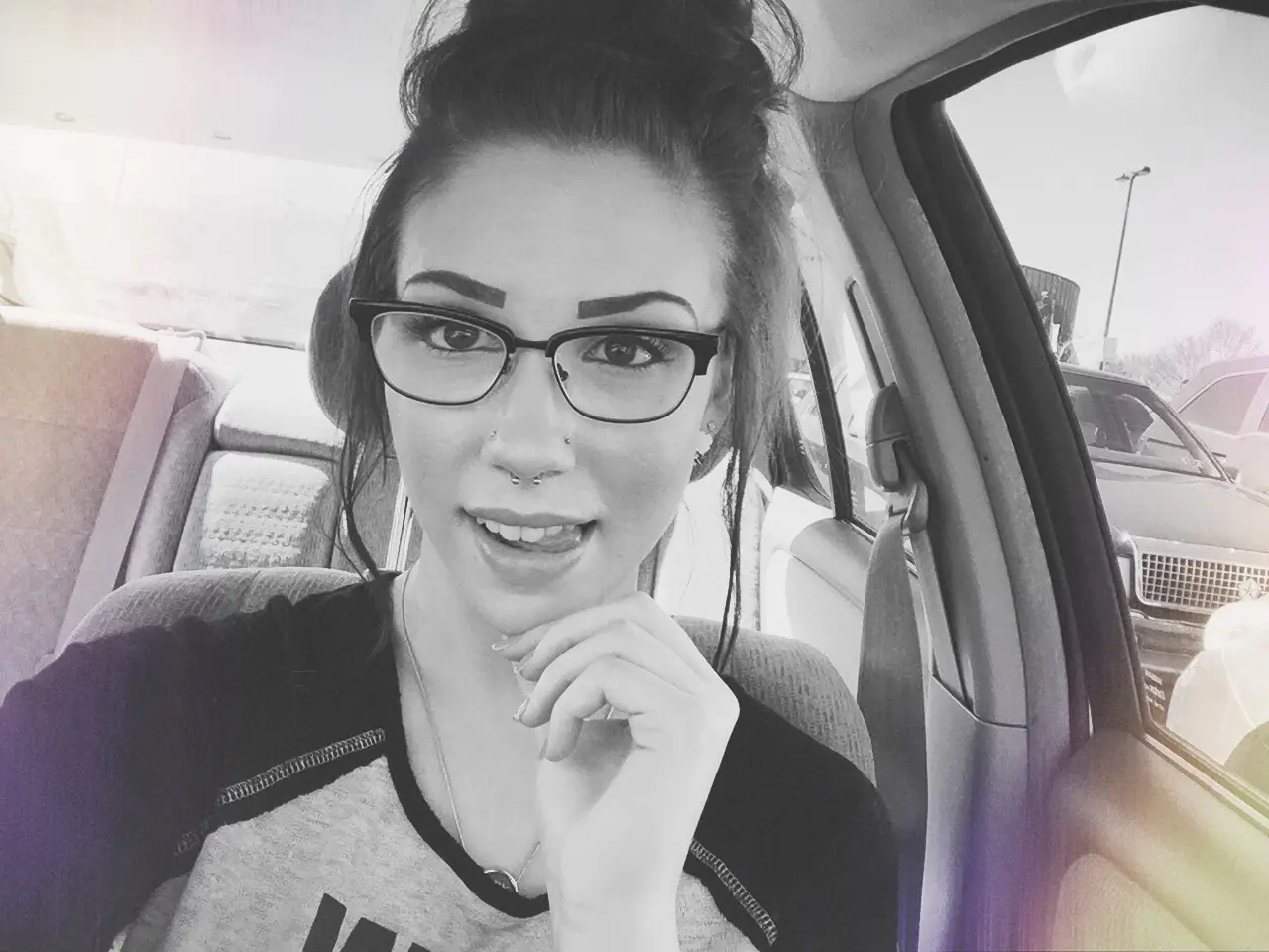 Seductive Girl in Glasses Tempts with Smile - Amateur Explicit Photo
